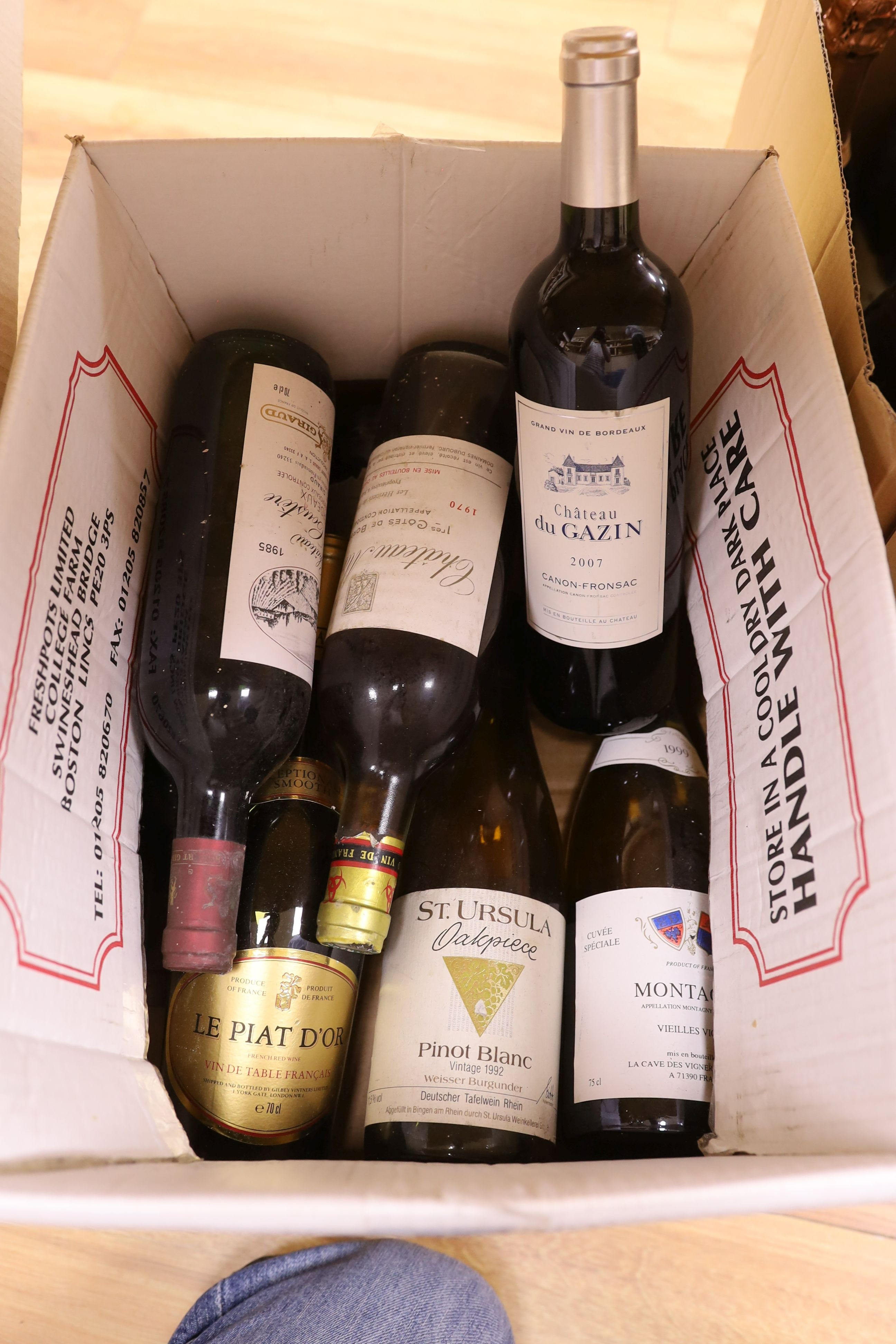 A group of wines and champagnes including Chateau La Coustere, Laurent-Perrier, L.Gardner and a bottle of Renault cognac